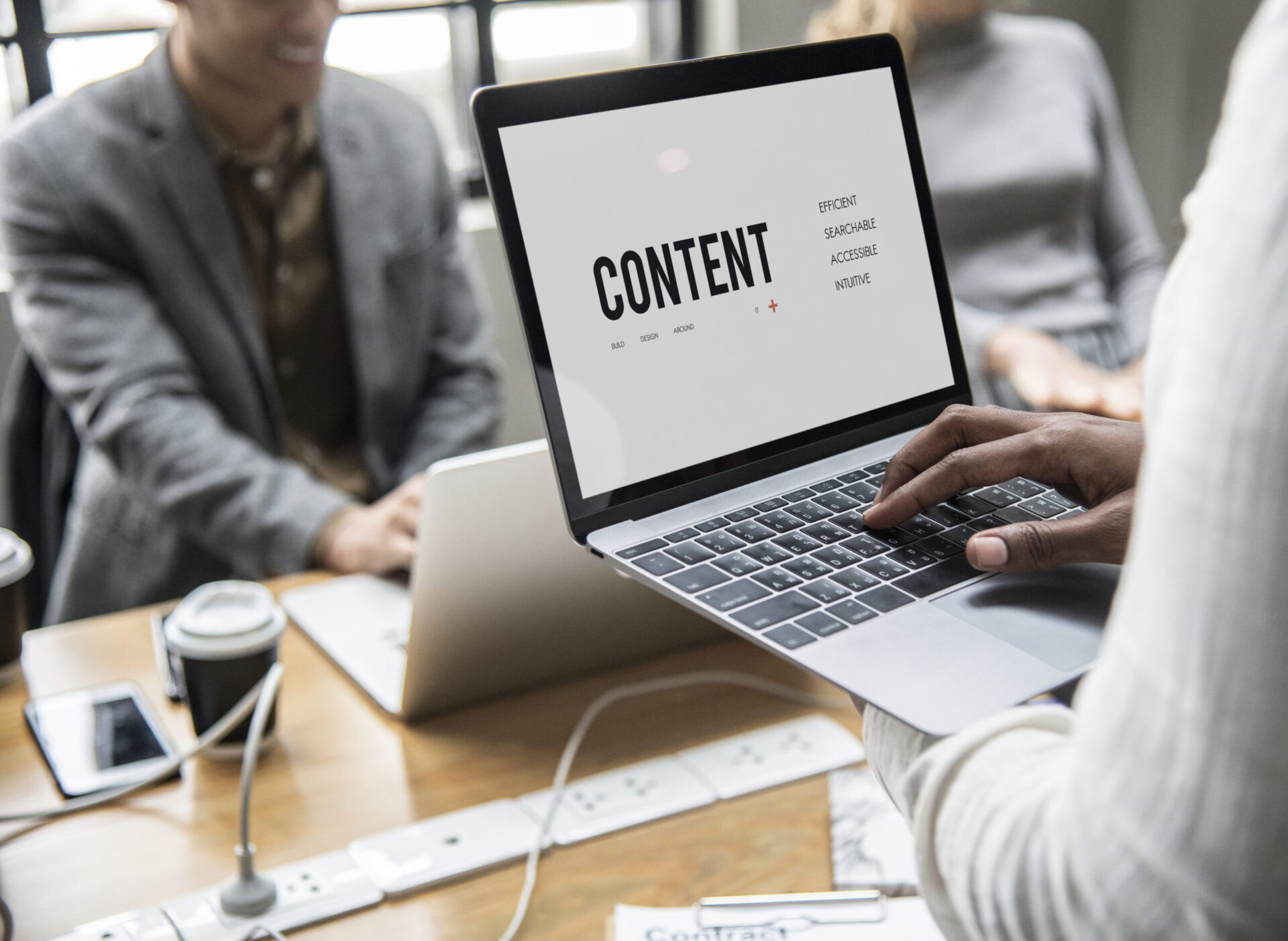 Laptop displaying content strategy in a team meeting | Webface