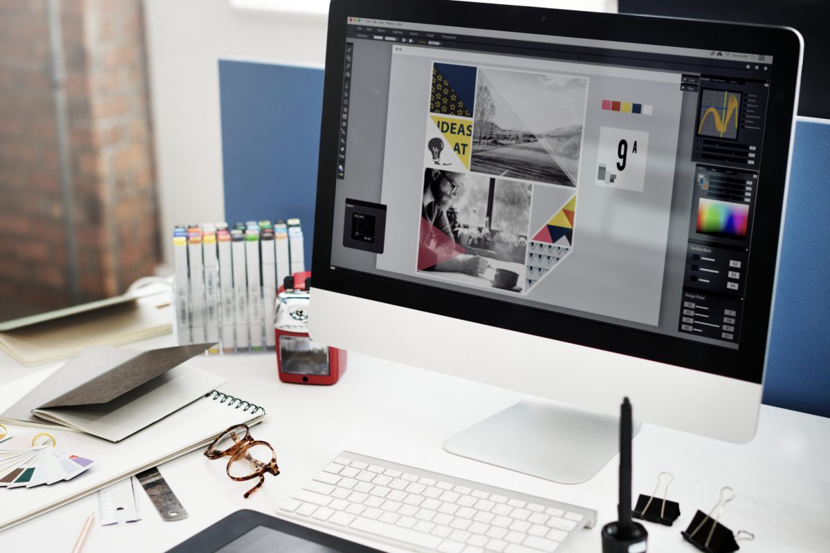 Computer screen showing a graphic design project with images, colors, and creative layouts for marketing purposes | Webface