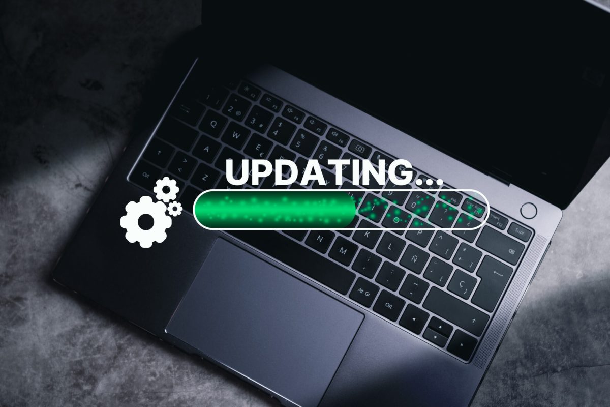 Laptop displaying software update progress bar symbolizing website maintenance and system upgrades | Webface